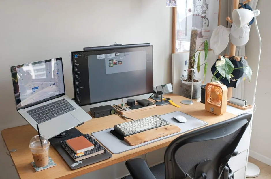 A tablet displaying a financial website, paired with a white keyboard and mouse. Perfect for stock visuals with a tech theme.